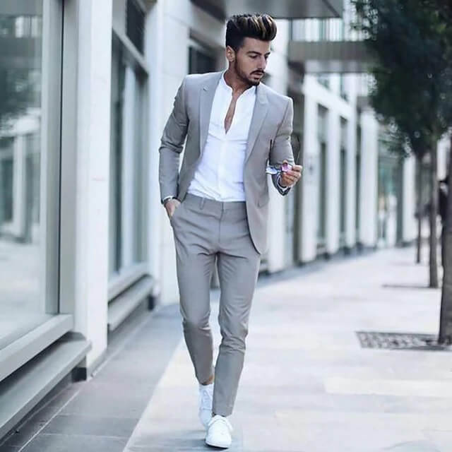 Quần tây nam đồng phục may từ vải tuytsi mặt mịn treo trên móc có kẹp