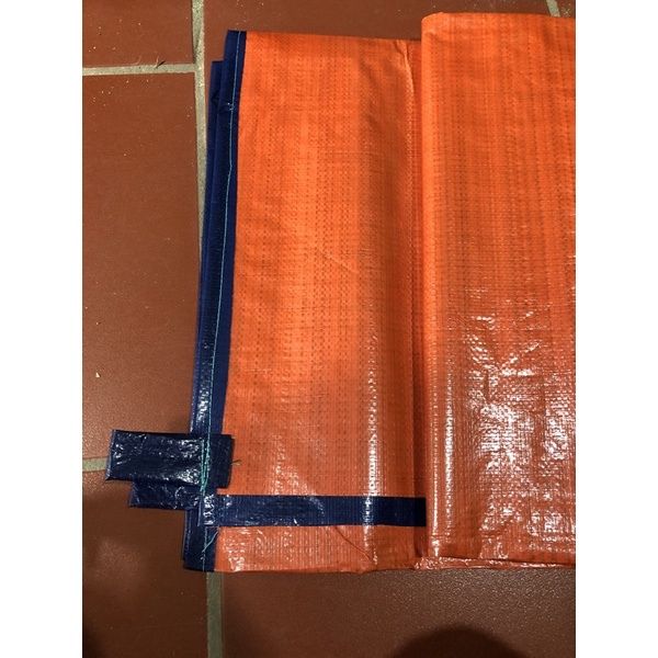 Bạt che nắng mưa hai mặt xanh cam với hai mặt có chức năng khác nhau